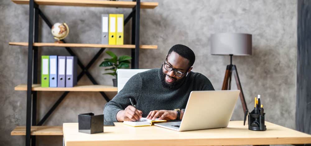 A business owner using laptop in the office